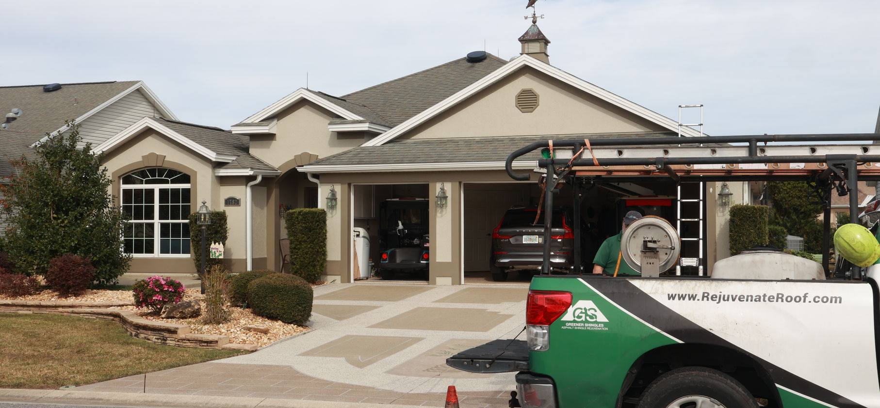 Roof Rejuvenate service truck at customer home